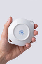 Bougie dans petite soupière en porcelaine