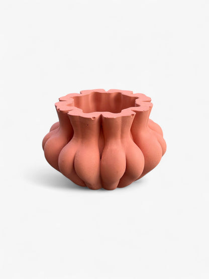 Pot en forme de fesse